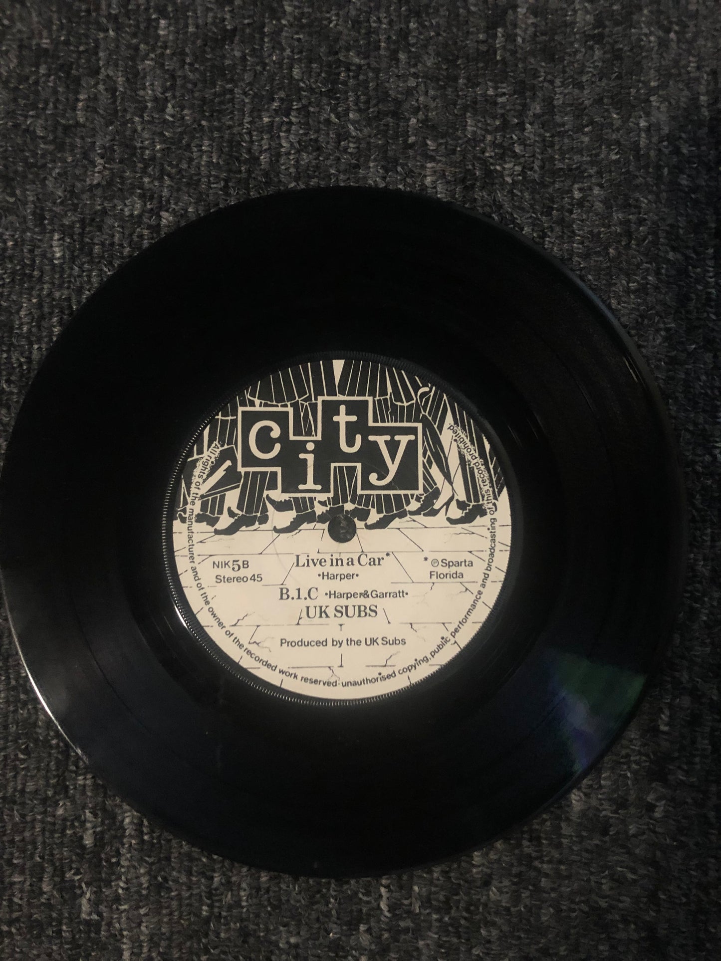 UK SUBS CID Live in a car 7” NIK5 City records